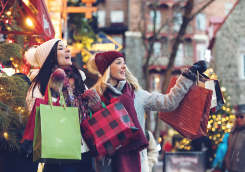 two women shopping in city